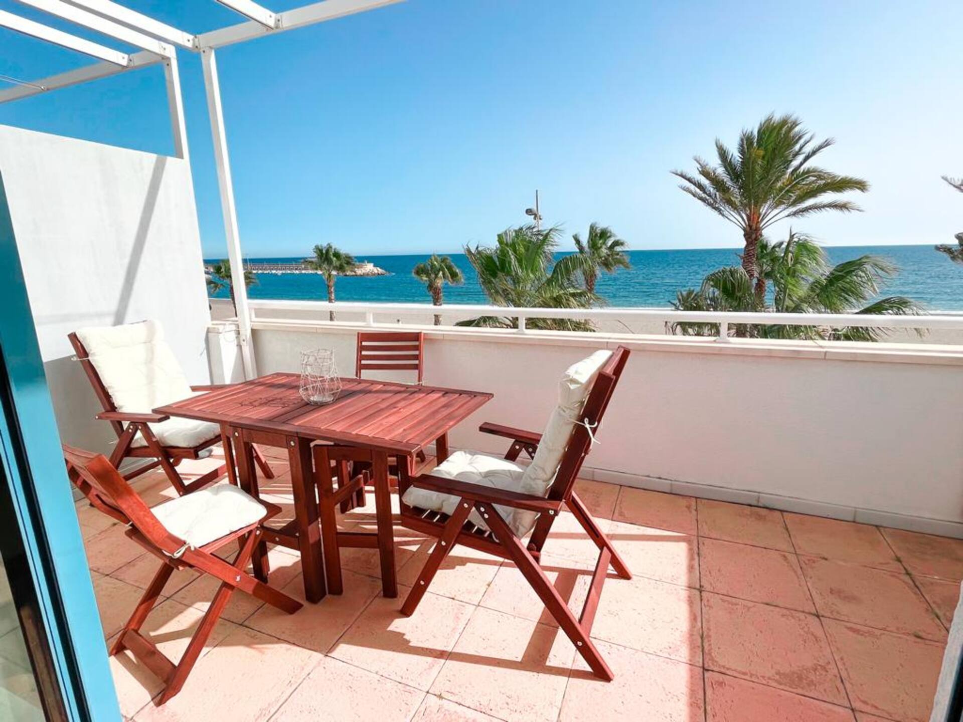 Beachfront penthouse with private garage