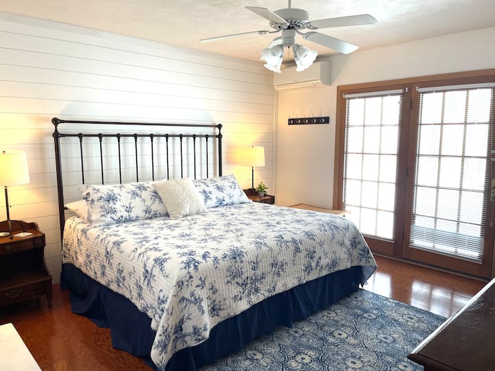 Main floor Master bedroom with 55 inch ROKU television