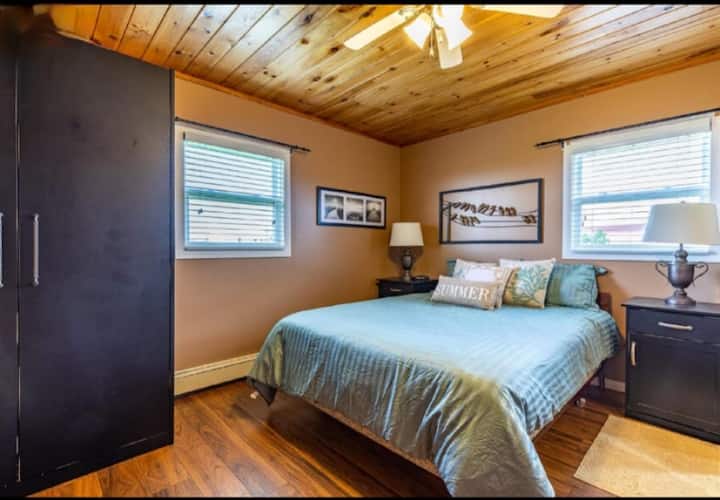 Master Bedroom with queen bed and ensuite.