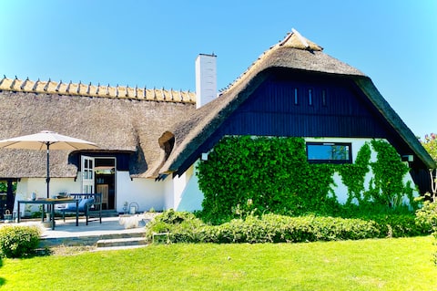 Charming holiday villa with fjord views.