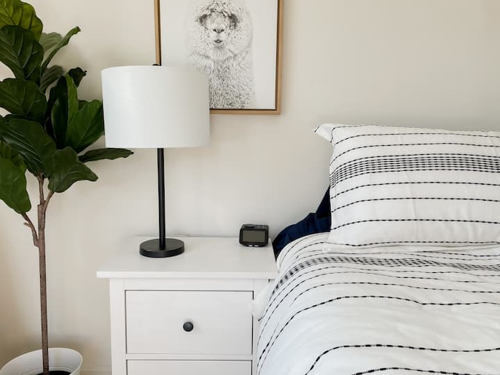 Sunny, large bedroom with King size bed. 4 big windows that let in brilliant sunlight, with privacy shades for your comfort.