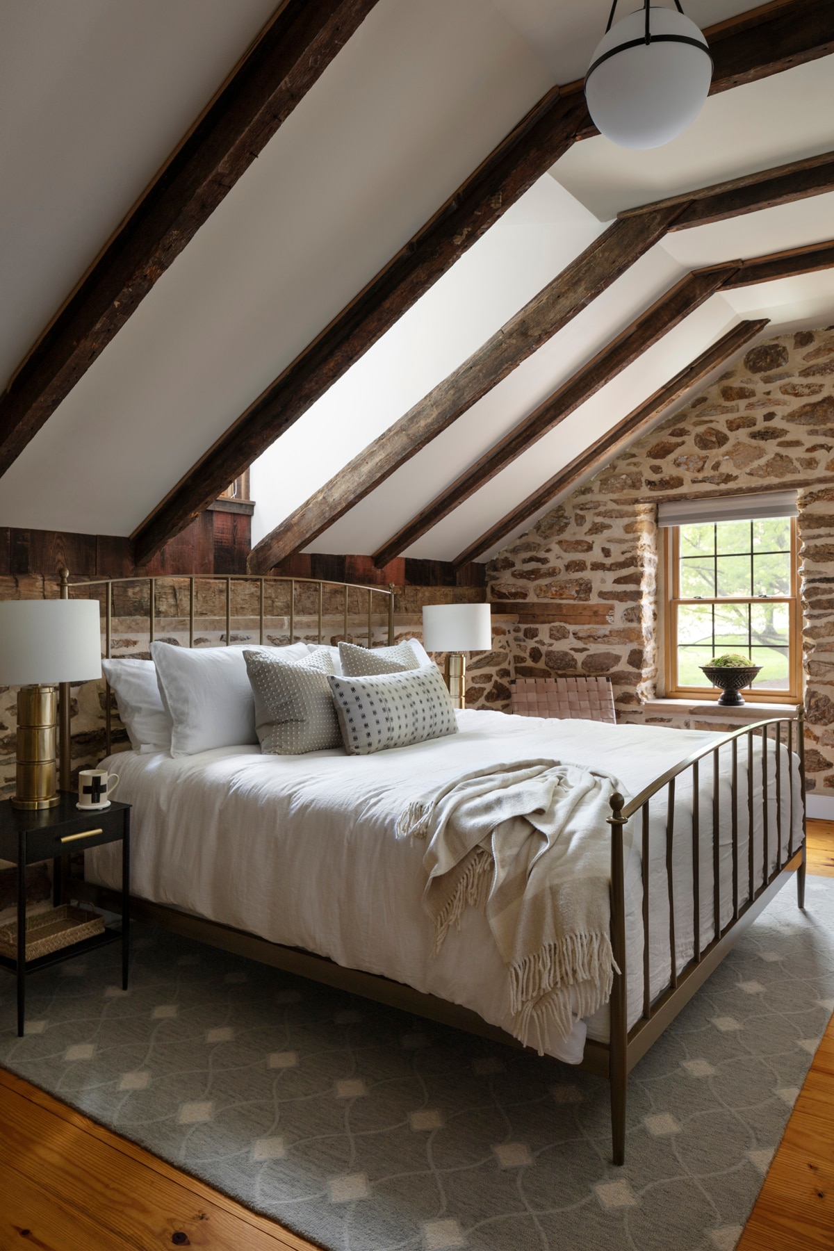 Distillery House - Enjoy some R&R in the 3rd bedroom, featuring a king size bed from Crate & Barrel, the same stunning exposed ceiling beams and stone walls that you find throughout.