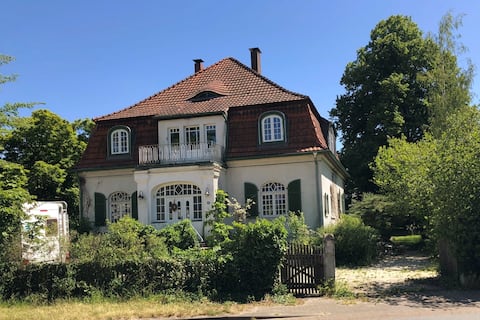 Country house apartment with fireplace and garden sauna