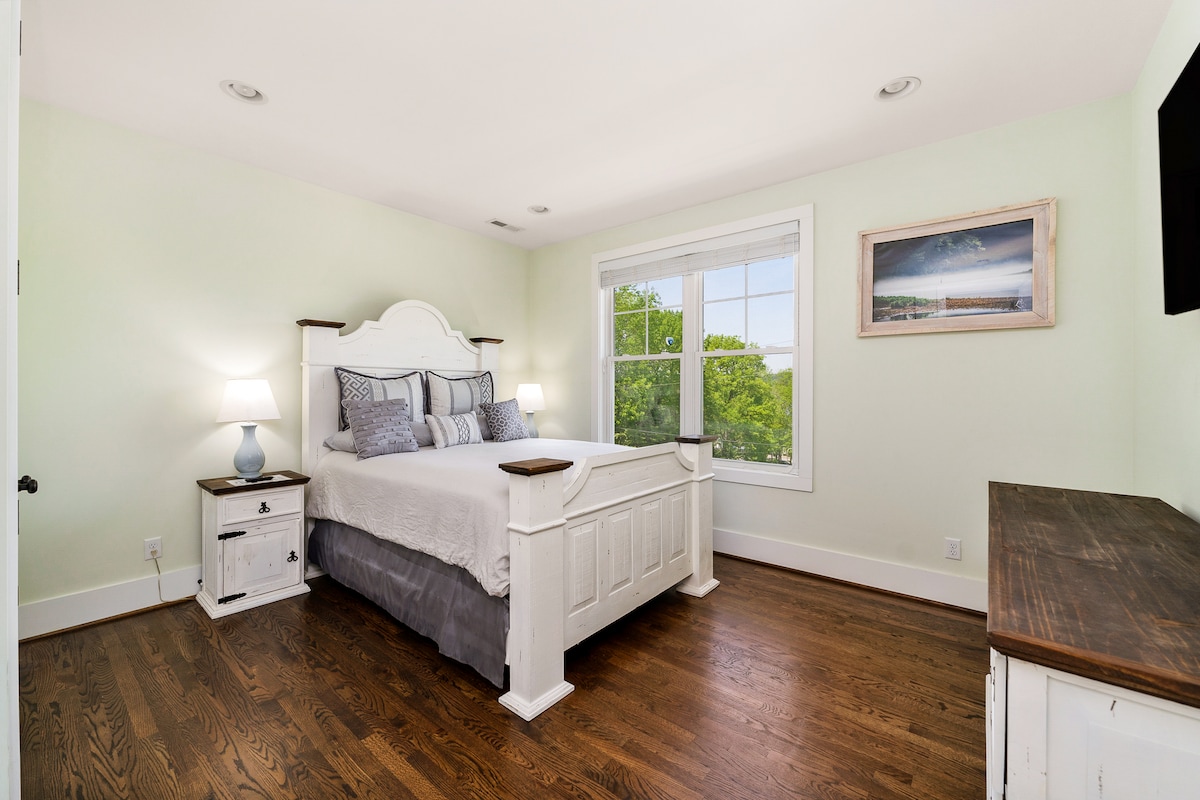 Upper level queen bedroom with a view