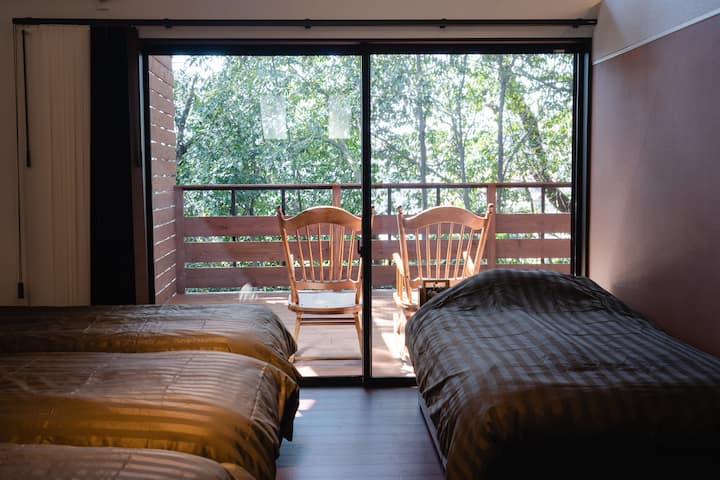 It's an evergreen tree, so the view from the bedroom is always the same