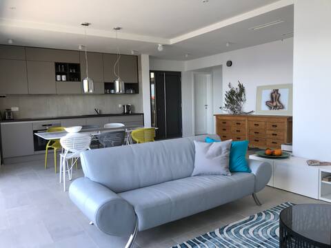 Successful Airbnb property: Retreat in a modern and calm beach apartment in Rava