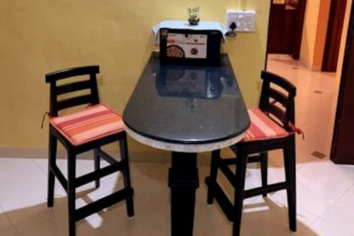 A funky breakfast table that can double up as a cozy work space!