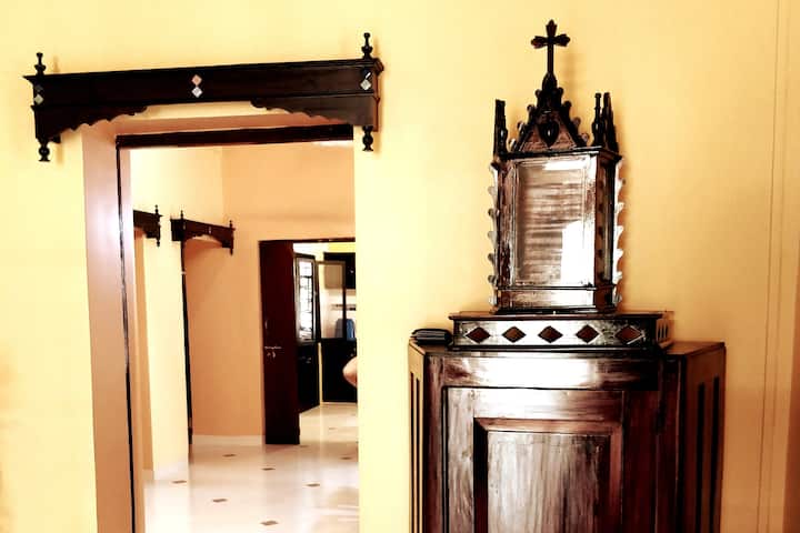 An antique roman catholic alter in the hallway. This feature is quite common in Indo-Portuguese homes of that era.