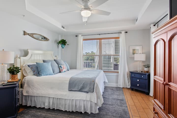 Just look at this stunning Master bedroom with a king bed.