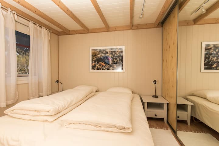 Bedroom in Panoramic Midnattsol apartment sleeps two persons in one double bed or in twin beds