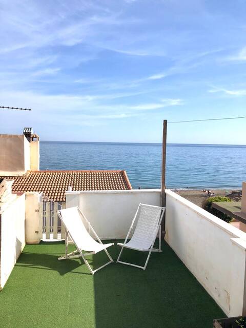 Beachfront penthouse with private solarium