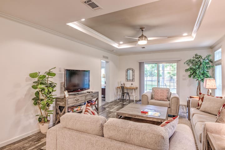 Livingroom showing side porch door and master bedroom doorway.