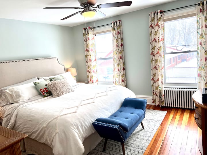 Primary bedroom- King bed with cotton/linen blend sheets.