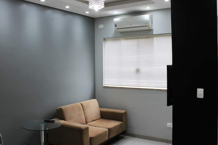 Sala de tv com ar condicionado.