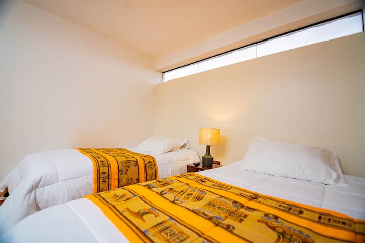 Room No. 02 contains 2 beds and a half, 1 flat screen TV, 1 wardrobe, 1 night sailboat,
