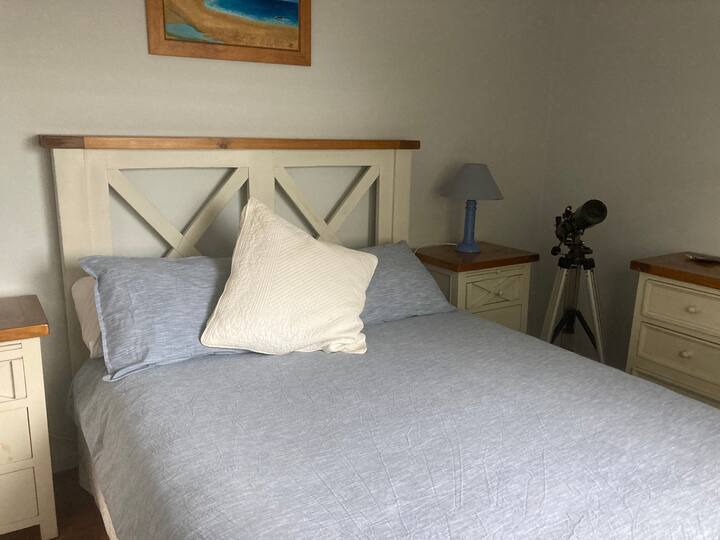 main bedroom with queen & glorious morning views