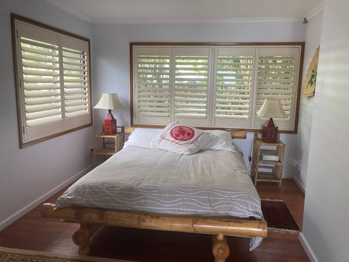 second bedroom surronded by garden with great ocean views