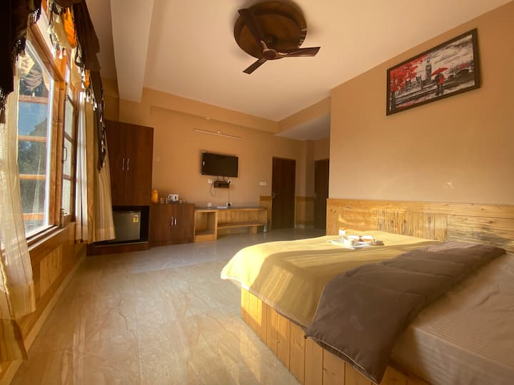 Very spacious room with ample storage space and classy modern furniture.