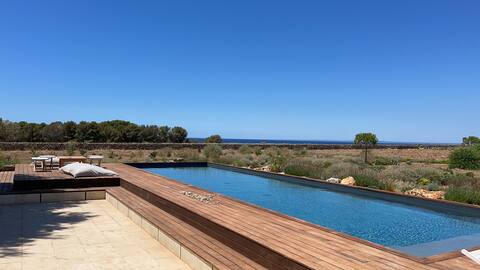 Beachfront Park villa with pool and garden