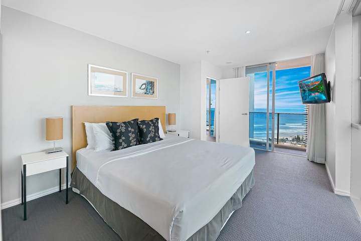 Main bedroom has both ocean views from its own balcony and river views from the floor to ceiling windows.