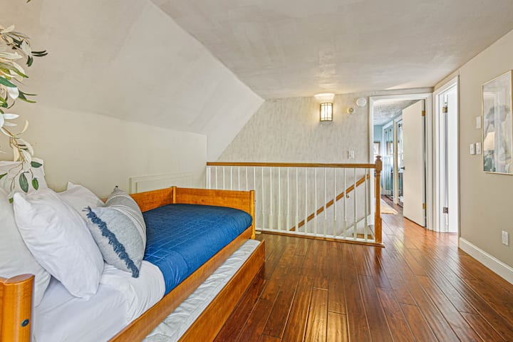 The Loft is directly upstairs from the main level. The 3rd level consists of the Loft, the King Bedroom, and a Full Bathroom. 

The Loft has a twin bed with twin trundle.