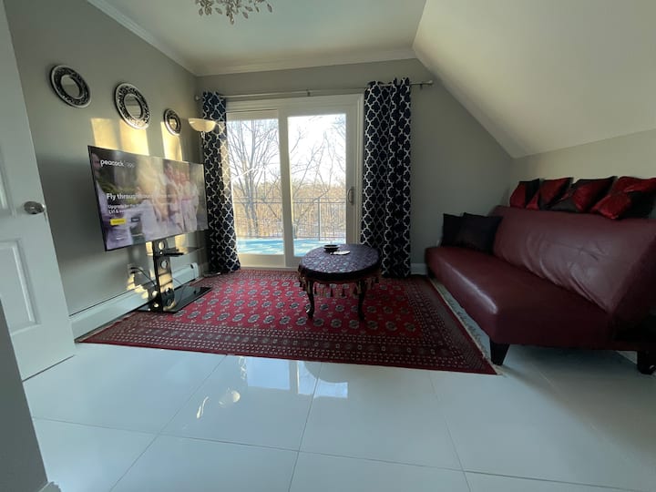 Lovely large studio home with two  patios