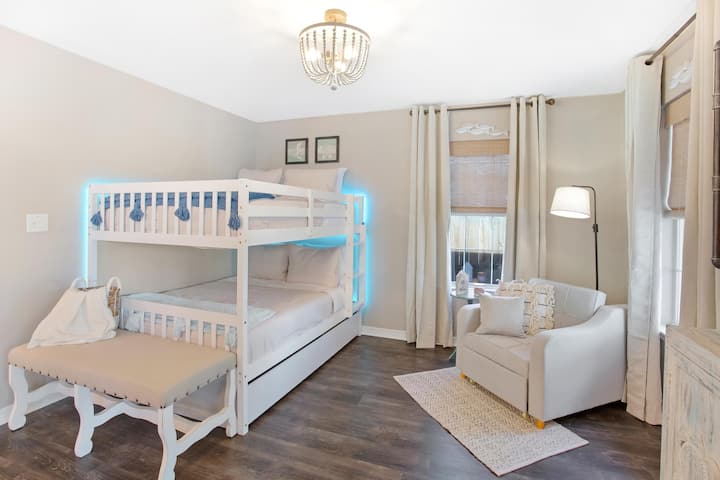 The extra sleeping space in the den makes  a fun spot for kids or young adults. With The Full over Full bunk and pull out sleeper chair, this area can sleep up to 5!