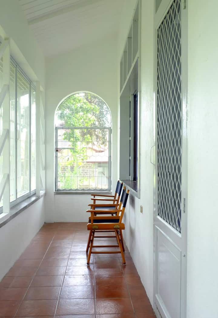 Main bedroom's private screened porch.
