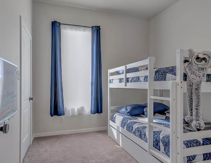 A great room for the kids with a bunk bed with two double beds and a twin trundle that pulls out from underneath the bottom! Don't forget to leave a note on the white board!