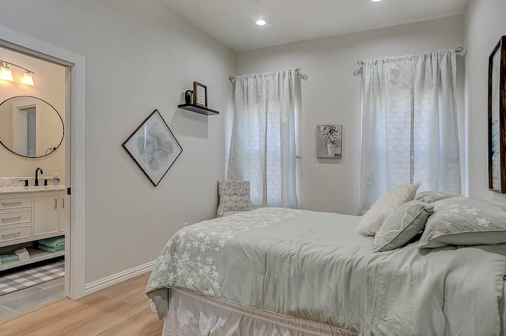 Master bedroom with queen bed and attached full bathroom!