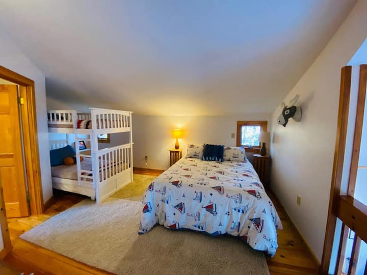 2nd floor bedroom with queen bed and twin bunk beds