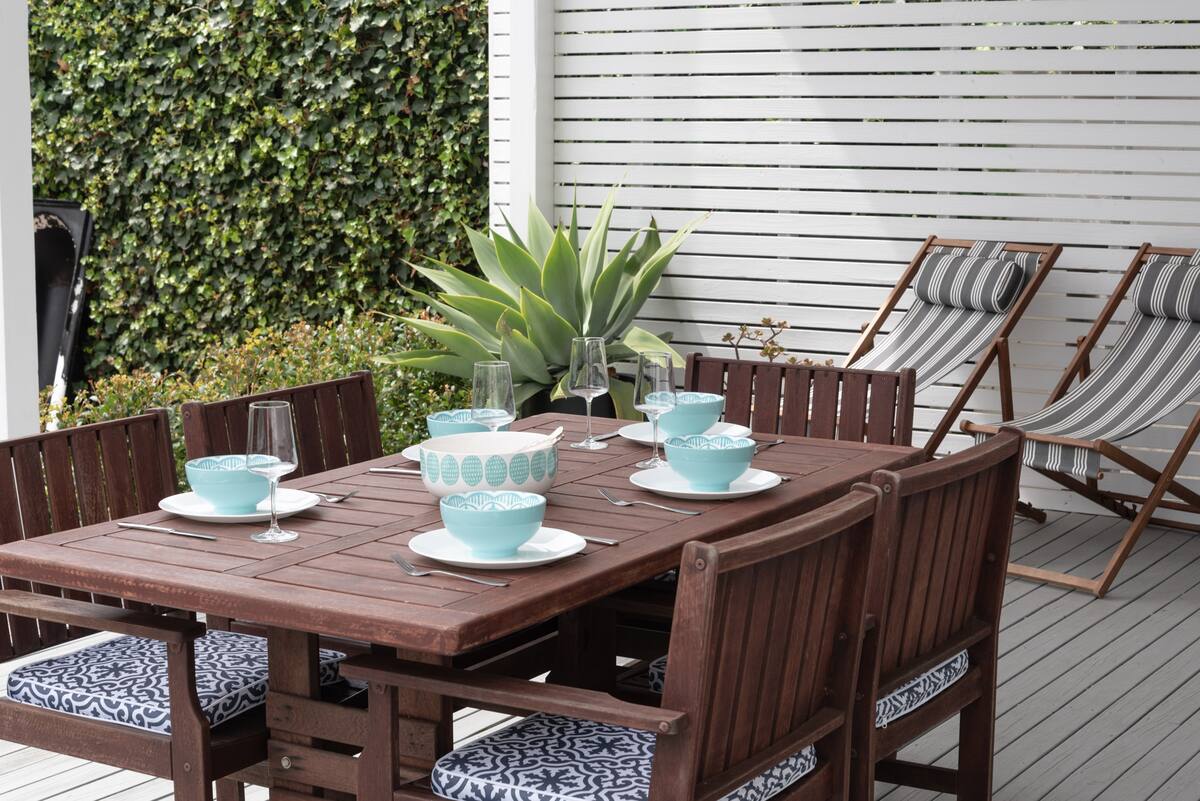 Gigi’s Beach House · sunny deck and private garden