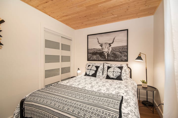 Bedroom 2 | Reading Light | View of Forested Yard | Your Peaceful Retreat in Nature