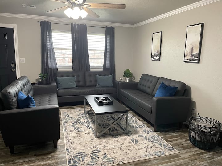Enjoy the leather couches in the spacious living room seating area. Smart TV has access to all the apps you need for entertainment. Charging blocks are available on each end table.