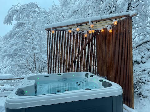 Find peace by the fjord and experience nature and the northern lights.