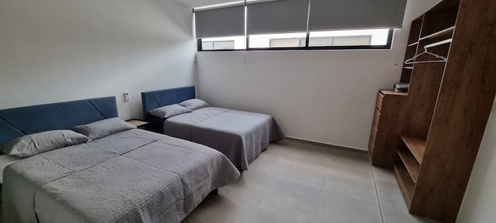 Secondary bedroom with two double beds