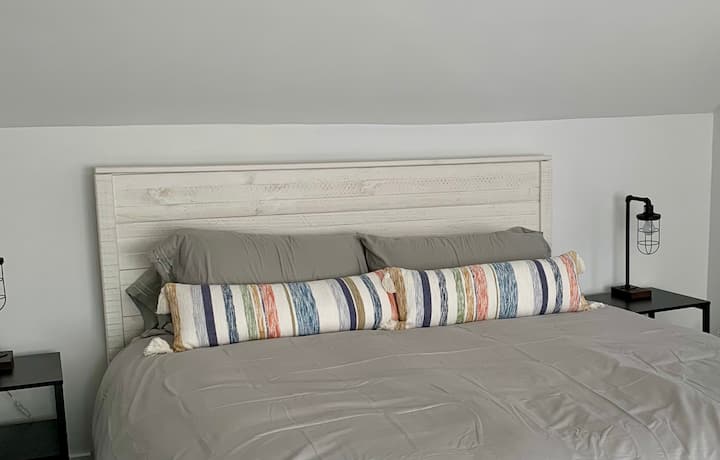 Comfortable, brand-new king bed and mattress in the 3rd floor suite.