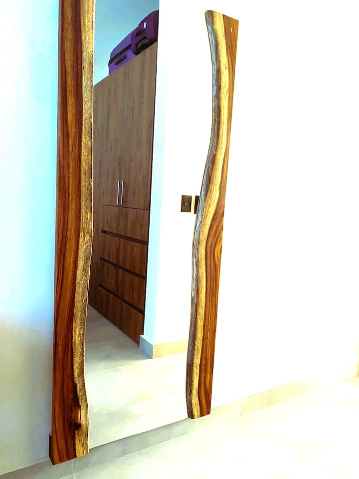 Full-length custom-made mirror to give you the confidence you need. 