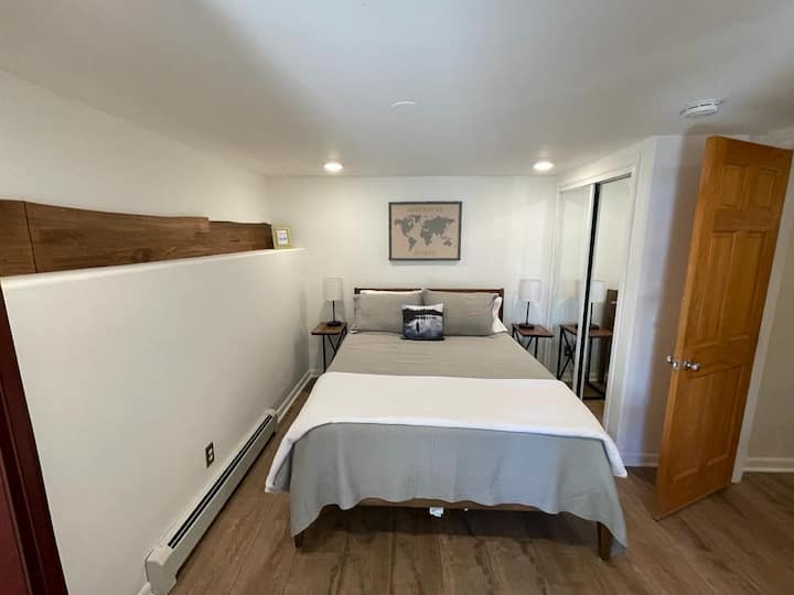 Super comfortable queen bed in second bedroom with full closet.  French doors empty on to a dedicated patio with beautiful views of the Flatirons.