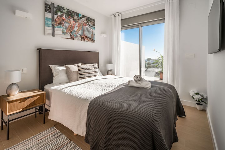 Bedroom 'los burritos' with south balcony and Samsung TV