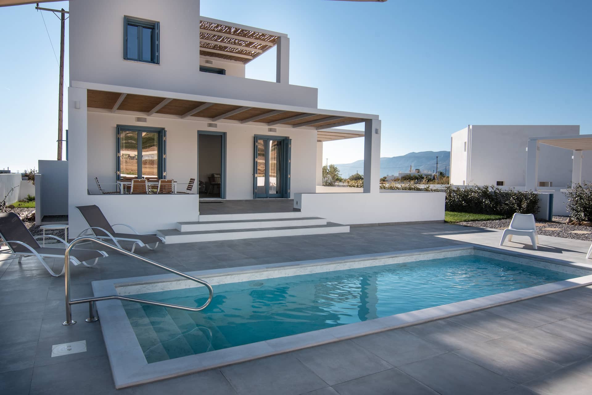 Whitewashed villa with private pool and blue shutters, Skyros