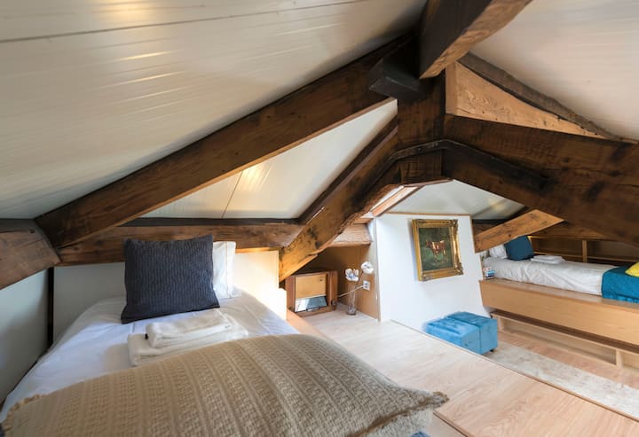 Beautiful attic with two single beds and natural light. 
