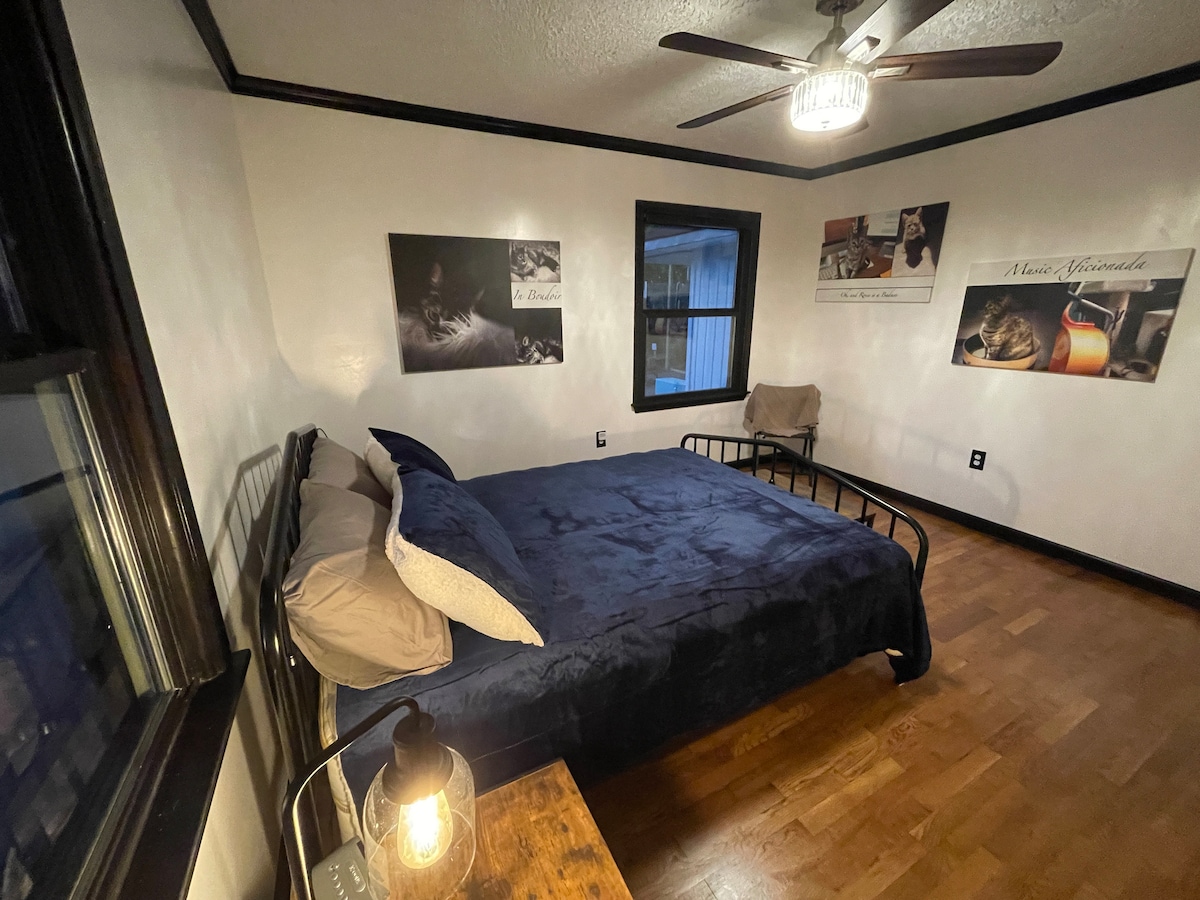 Bedroom 1: Rosie's Blue Boudoir. Complete with queen bed and plenty of room for luggage, hanging space, and more! Our all new bedding is AMAZING and so comfortable!