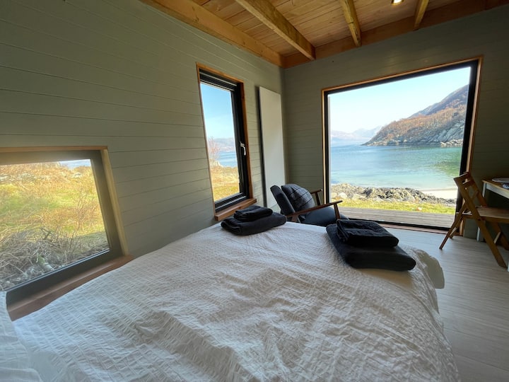 Secluded shoreline artist's bothy