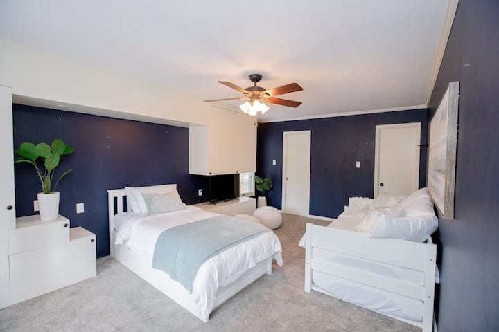 Secondary bedroom with private bath and large walk-in closet.  Both beds have trundle beds underneath to allow for extra guests and built ins to store your belongs in comfort while you stay. 