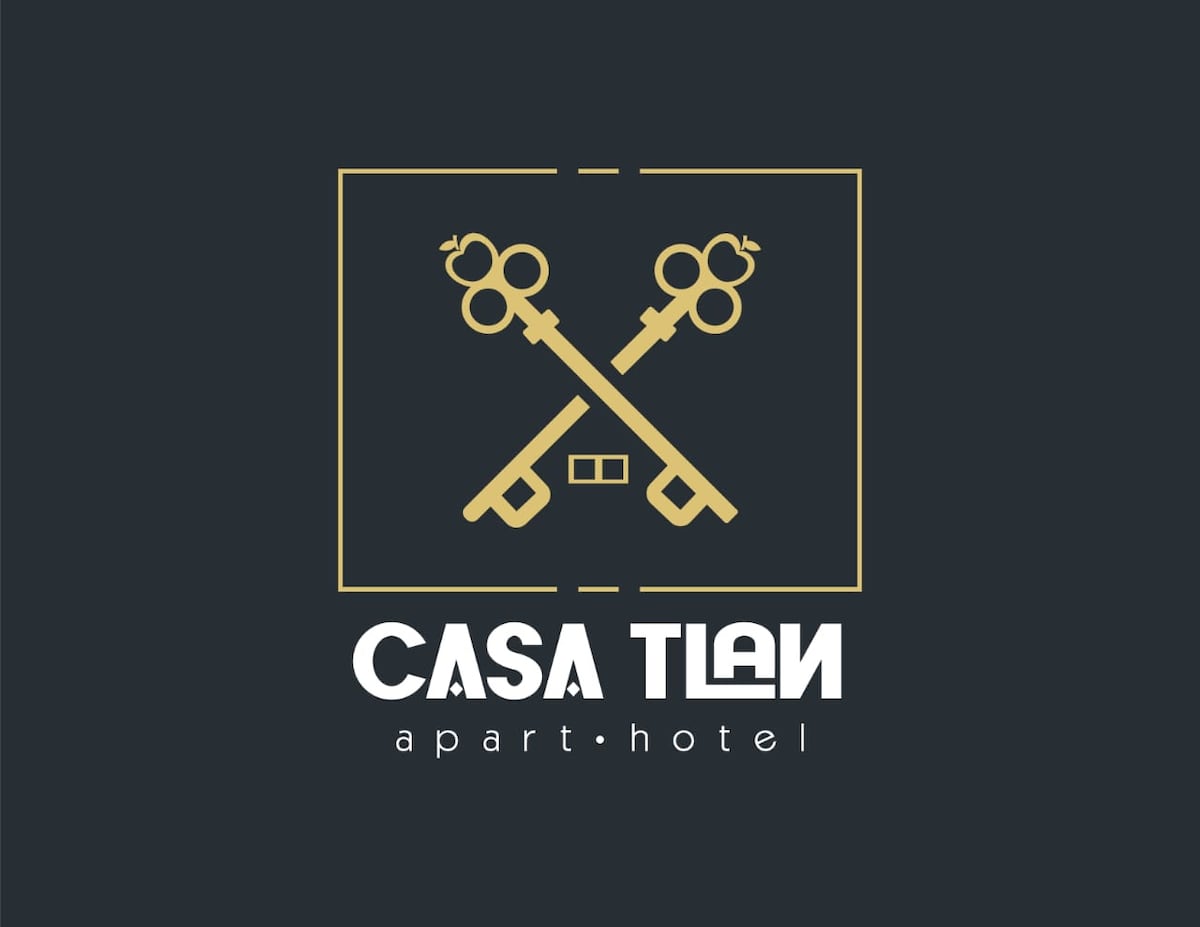 The image features a logo for Casa Tlan, consisting of two crossed keys in gold against a dark background. Below the keys, the name 'CASA TLAN' is presented in bold white letters, with 'apart.hotel' displayed in a smaller font beneath.