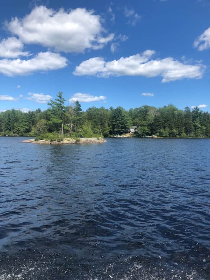 Maine camp on lake with private island near Acadia Cottages for Rent