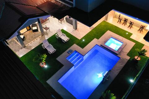 House with pool next to the tropical forest