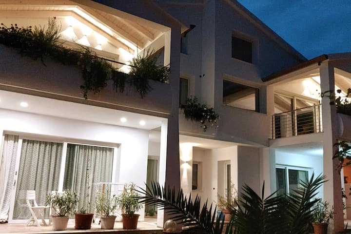 Charming villa overlooking La Caletta harbor