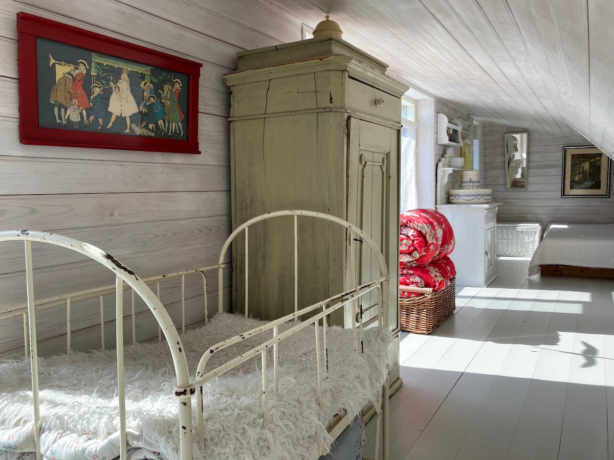 The sleeping loft with the crib